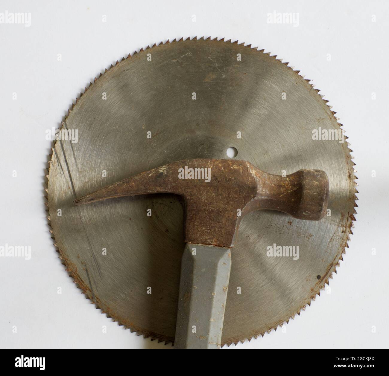 A High Angle View of a Carpenters Hammer and Panel Saw Blade Stock Photo