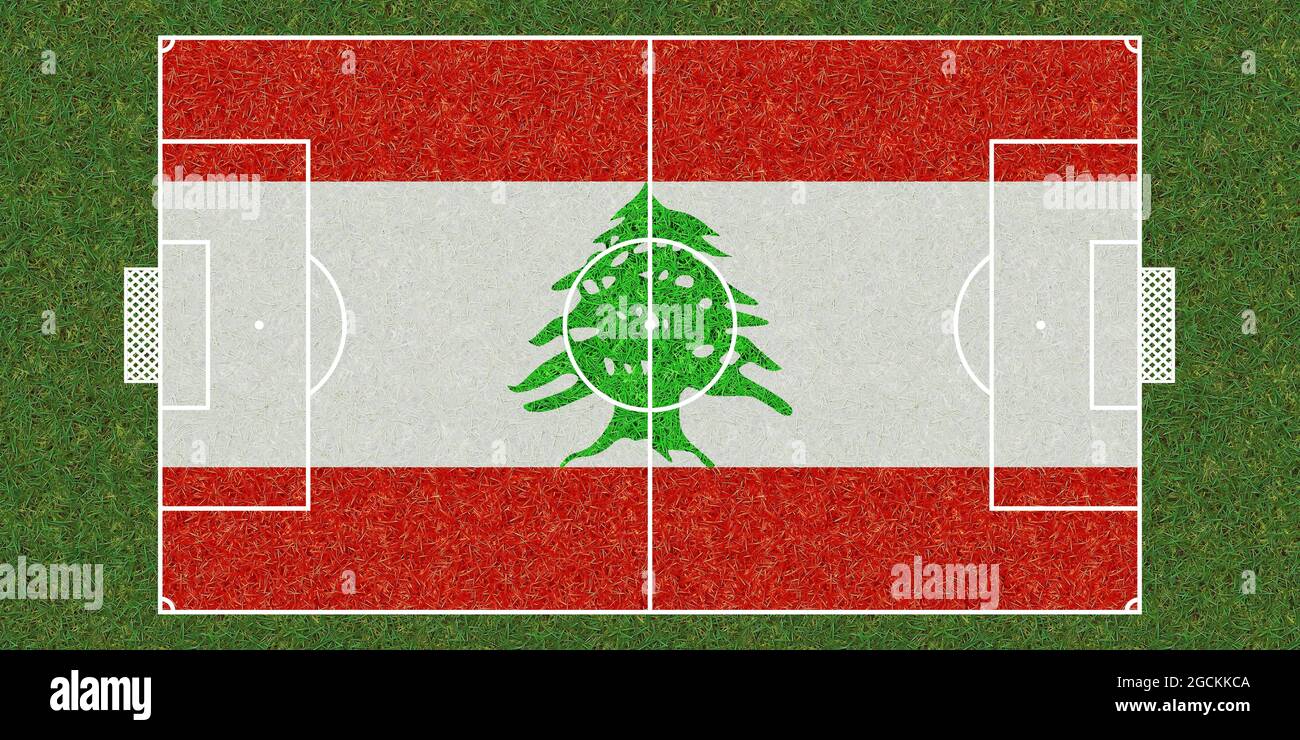 Top view of Green grass soccer field with flag of Lebanon. football