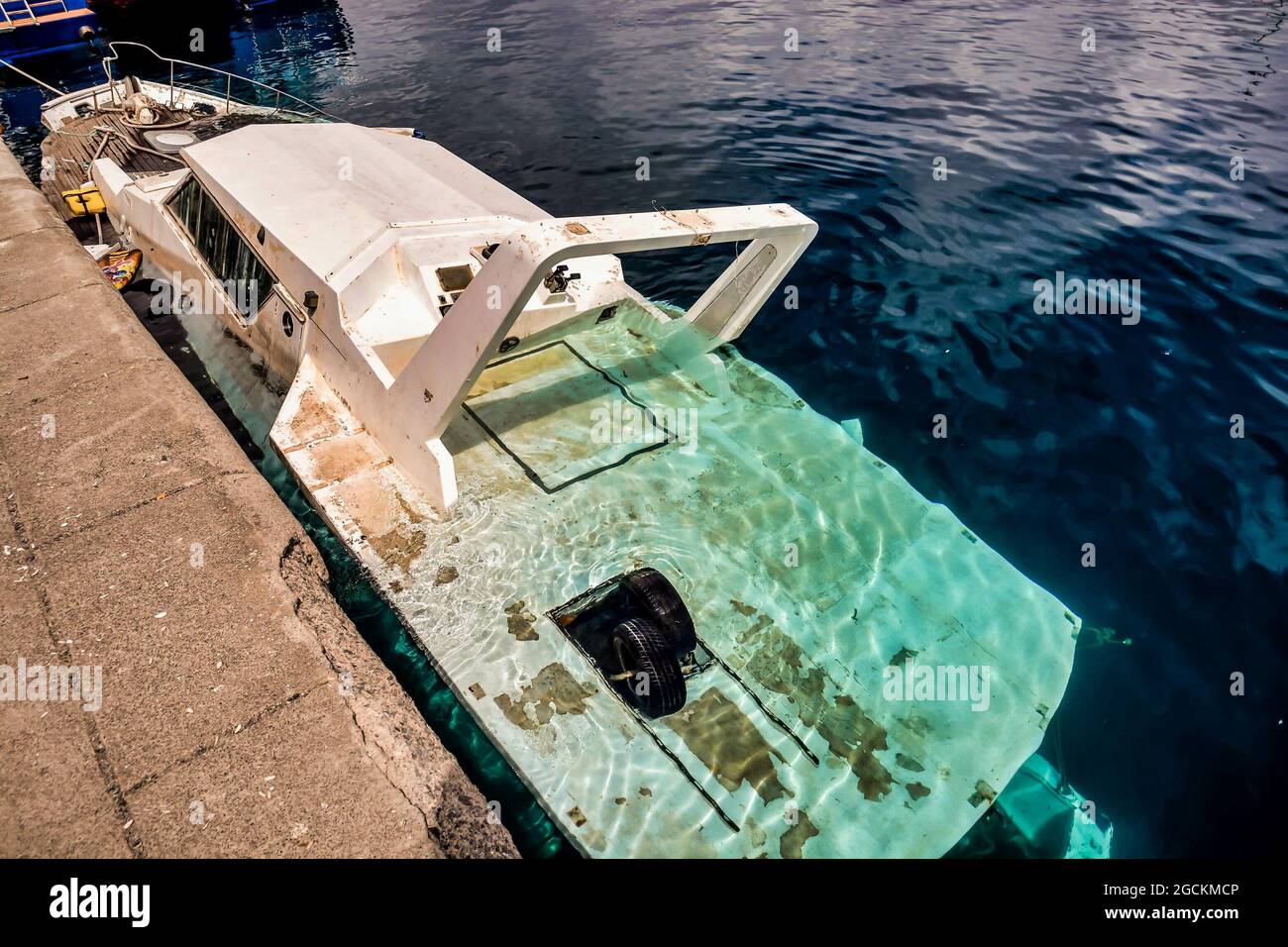 Yacht sinking in the water Stock Photo Alamy