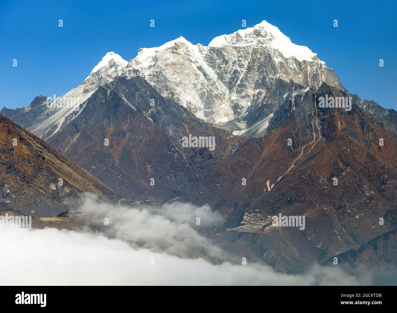 View of Portse village, mount cholatse and Tabuche peak - way to Everest base camp - Sagarmatha national park - Nepal Stock Photo