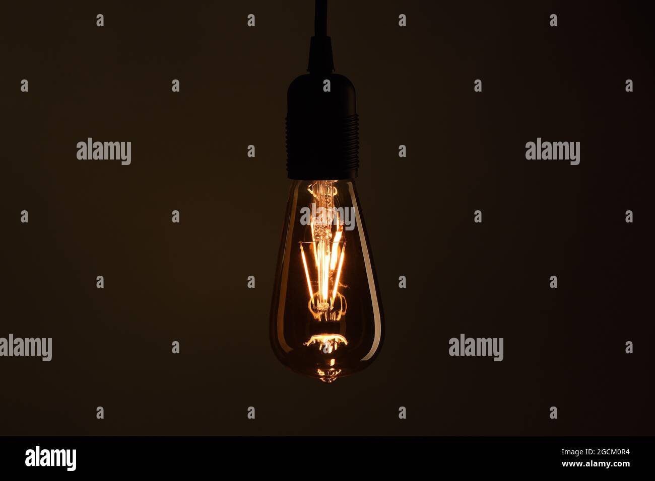 Light bulb on black background Stock Photo Alamy