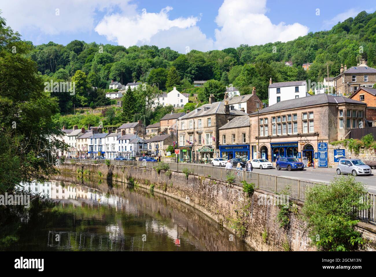 Matlock bath town centre with shops and cafes alongside the river Derwent North Parade Derbyshire England UK GB Europe Stock Photo