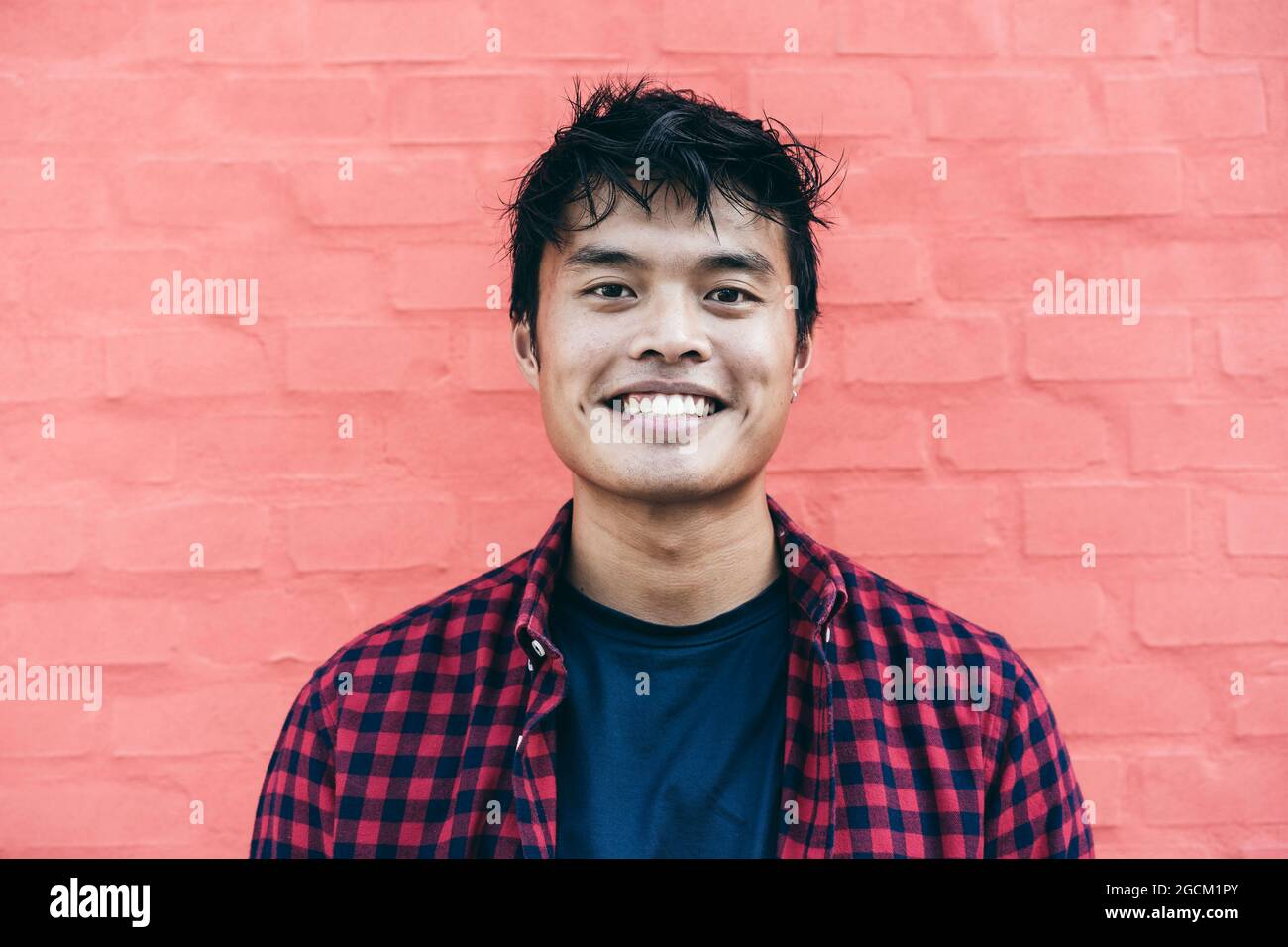 Happy Asian guy portrait - Confident asian young male having fun