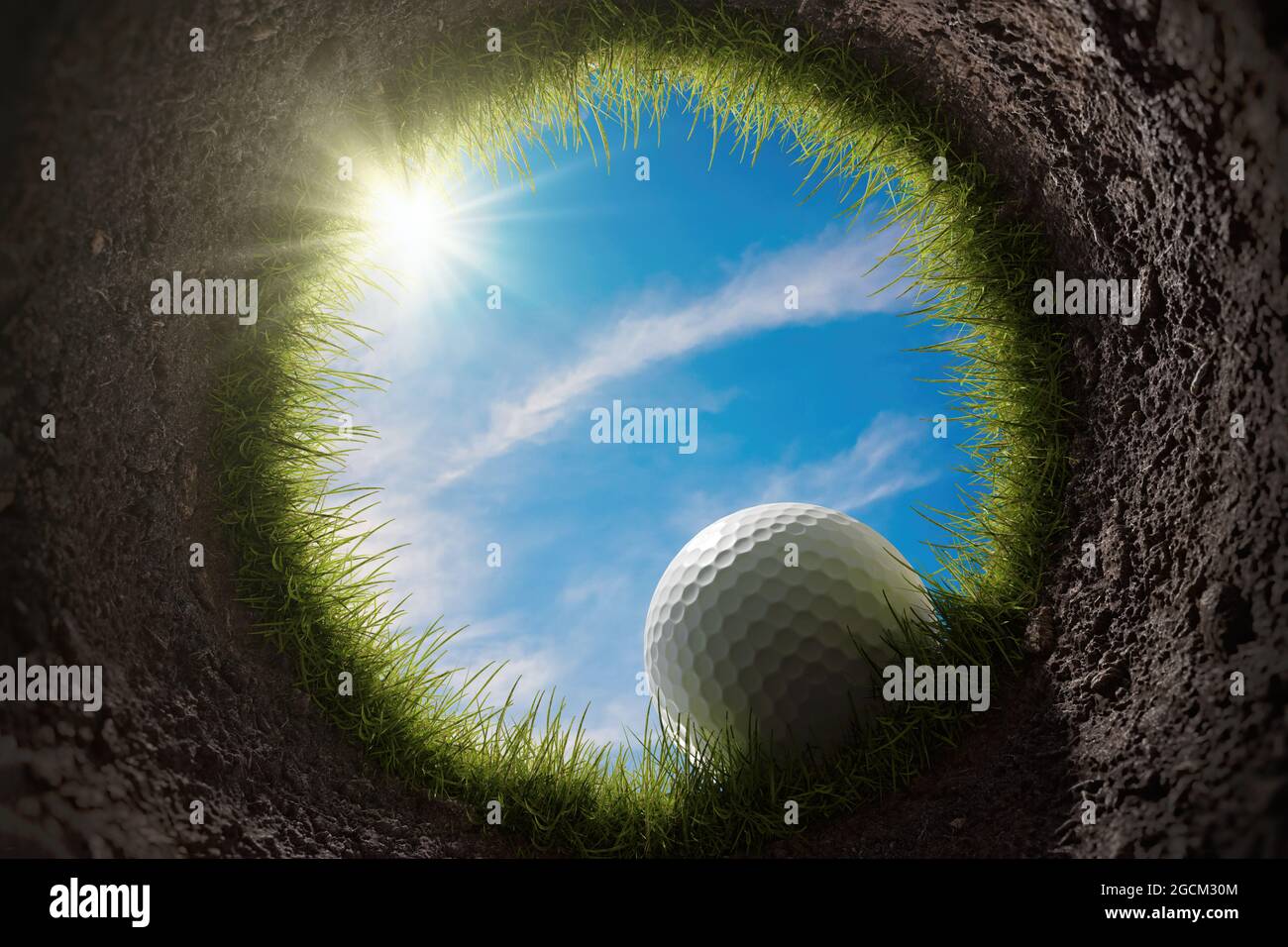 Golf ball is falling into hole. View from inside of hole. 3D rendered illustration. Stock Photo