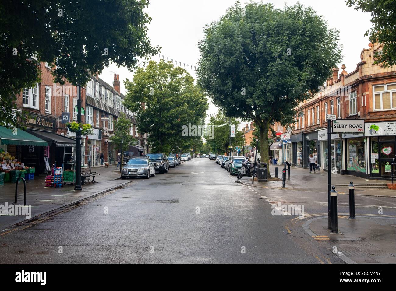 London August 2021: Pitshanger Lane shops, a busy high street of independent shops in Ealing, West London Stock Photo