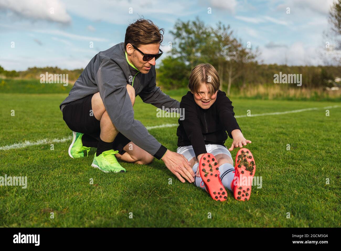 Football Trainer hand in a Pocket