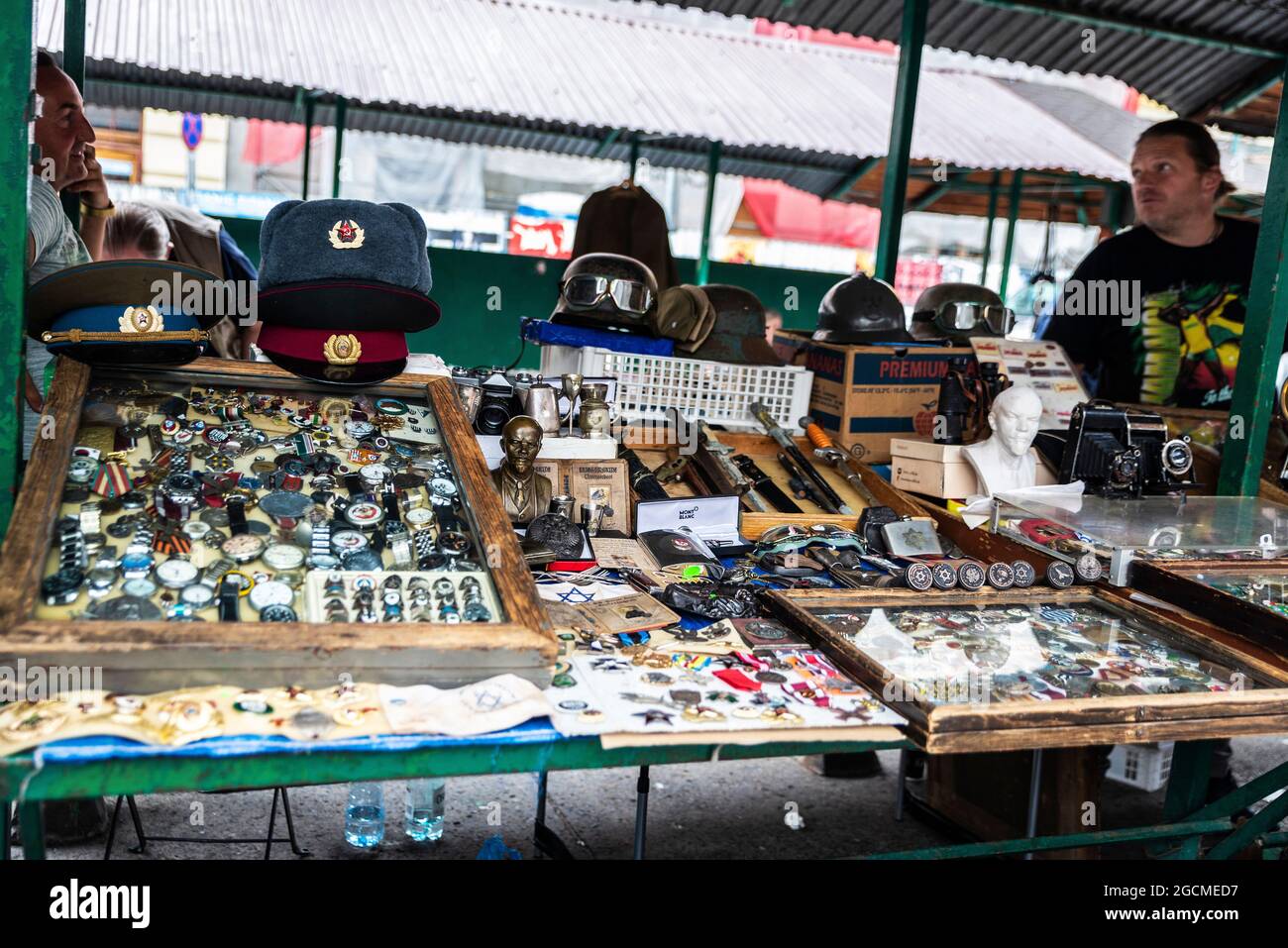 Krakow, Poland - August 28, 2018: Vendor in the flea market of the Plac Nowy that showcase an assortment of antiques in Krakow, Poland Stock Photo