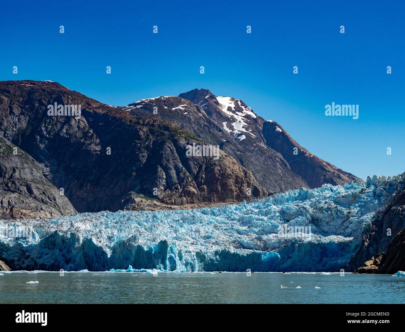 Exploring the beautiful tidewater glacier of South Sawyer glacier by zodiac in Tracy Arm wilderness area, Tongass National Forest, Alaska USA Stock Photo