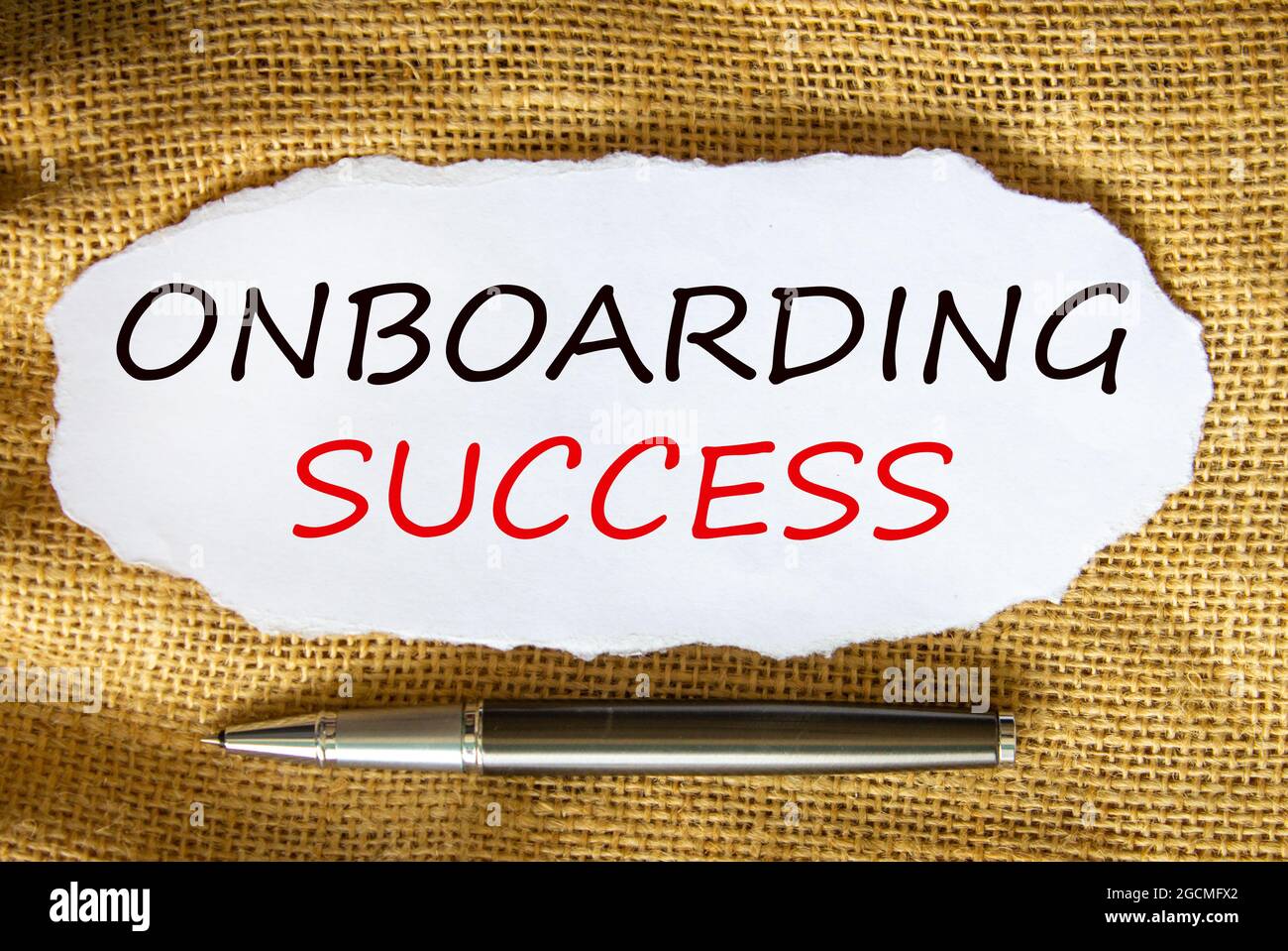 Onboarding success symbol. Words 'Onboarding success' on white paper ...