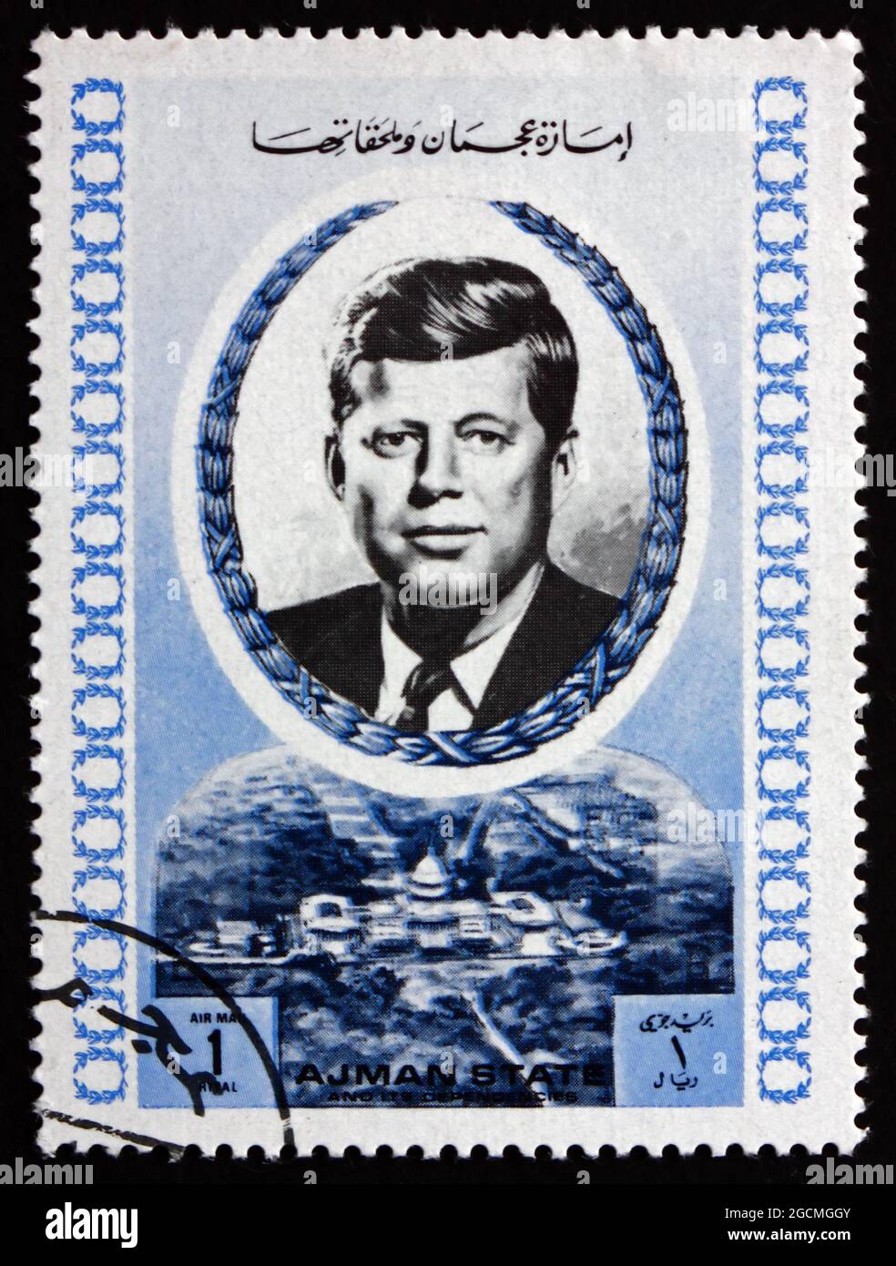 AJMAN - CIRCA 1972: a stamp printed in Ajman shows John F. Kennedy, an American Politician who Served as the 35th President of United States, circa 19 Stock Photo