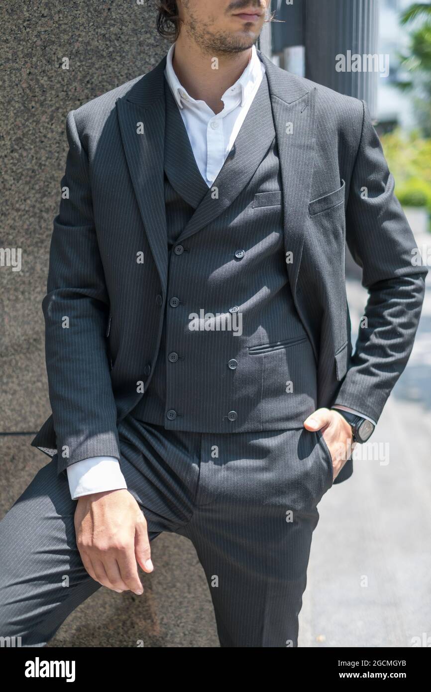 Fassion black suit on a young man. High quality photo Stock Photo