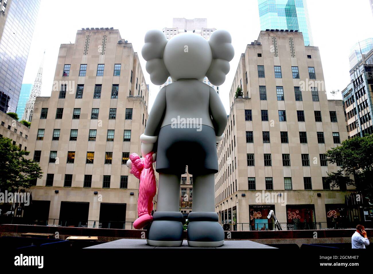 Kaws Statue by artist Brian Donnelly at The Rockefeller Center Plaza in  Midtown, New York, NY on August 9, 2021.Photo by Charles  Guerin/ABACAPRESS.COM Stock Photo - Alamy