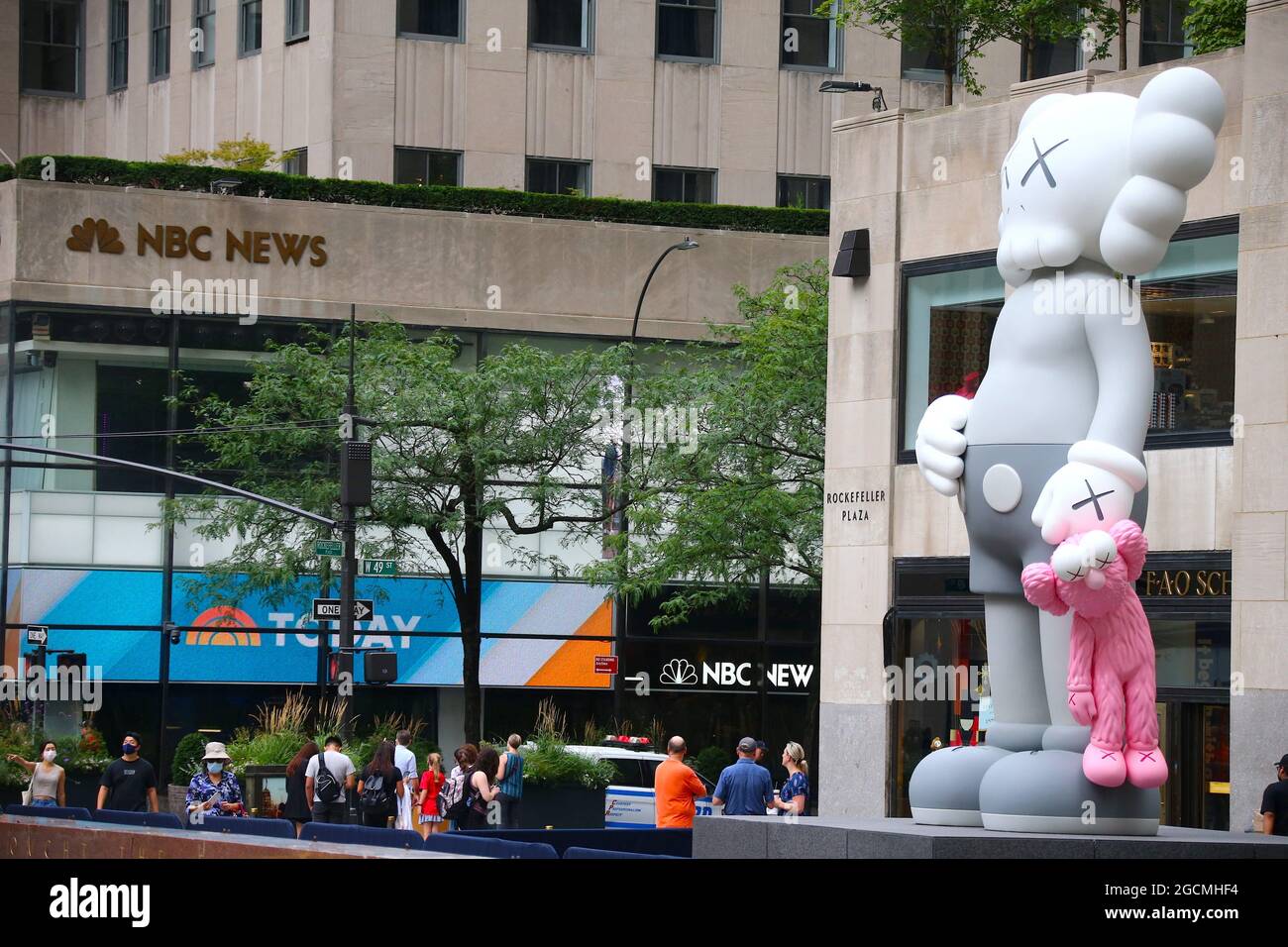 Kaws Statue by artist Brian Donnelly at The Rockefeller Center Plaza in