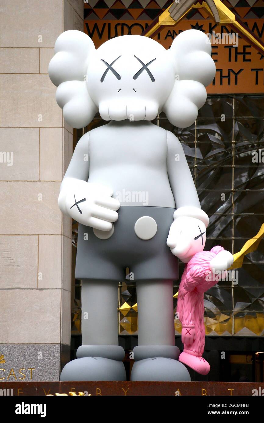 Kaws Statue by artist Brian Donnelly at The Rockefeller Center Plaza in