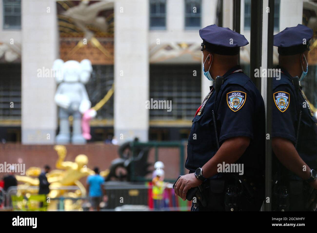 Kaws Statue by artist Brian Donnelly at The Rockefeller Center Plaza in