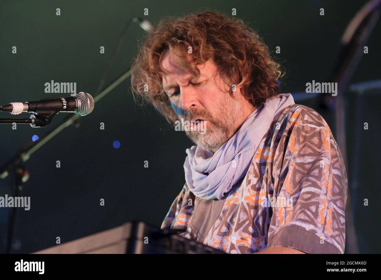 Wickham, UK. 08th Aug, 2021. Irish singer, songwriter, actor and musician, Liam O' Maonlai best known as the lead vocalist with Dublin band The Hothouse Flowers, playing keyboard while performing live on stage at Wickham Festival. (Photo by Dawn Fletcher-Park/SOPA Images/Sipa USA) Credit: Sipa USA/Alamy Live News Stock Photo