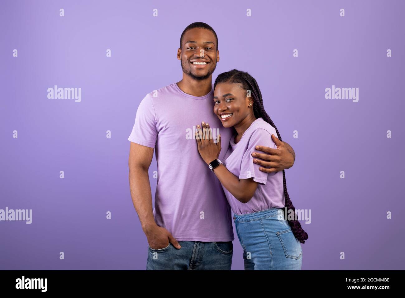 African American woman hugging her man at studio Stock Photo - Alamy