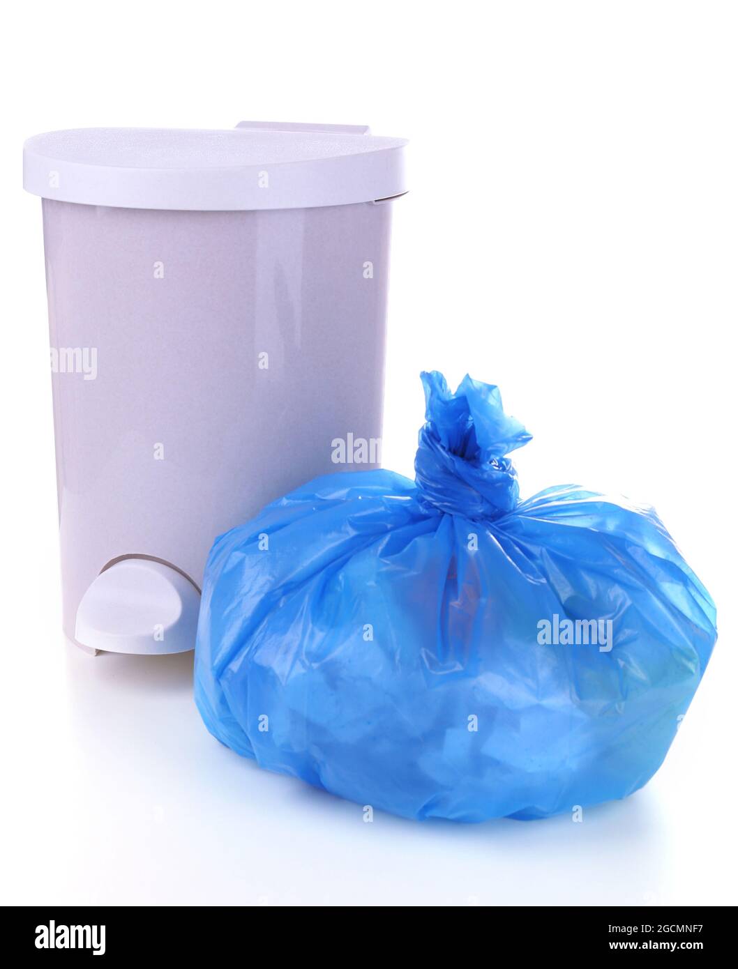 Garbage bin and plastic trash bag, isolated on white Stock Photo Alamy