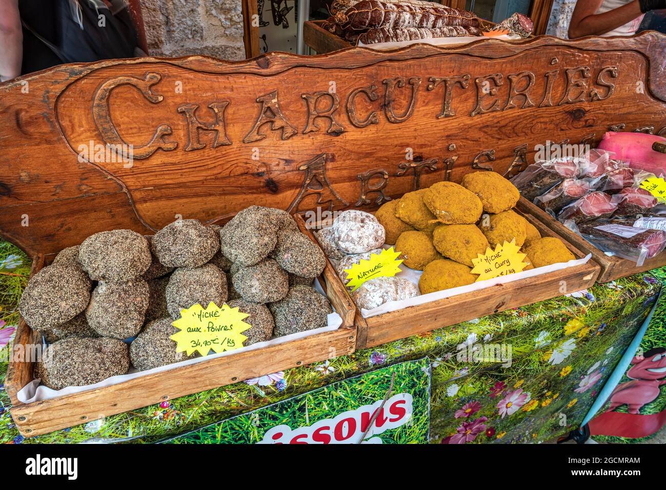 Typical products for sale on the stalls at the Annecy traditional market. Annecy, Savoie department, Auvergne-Rhône-Alpes region, France, Europe Stock Photo
