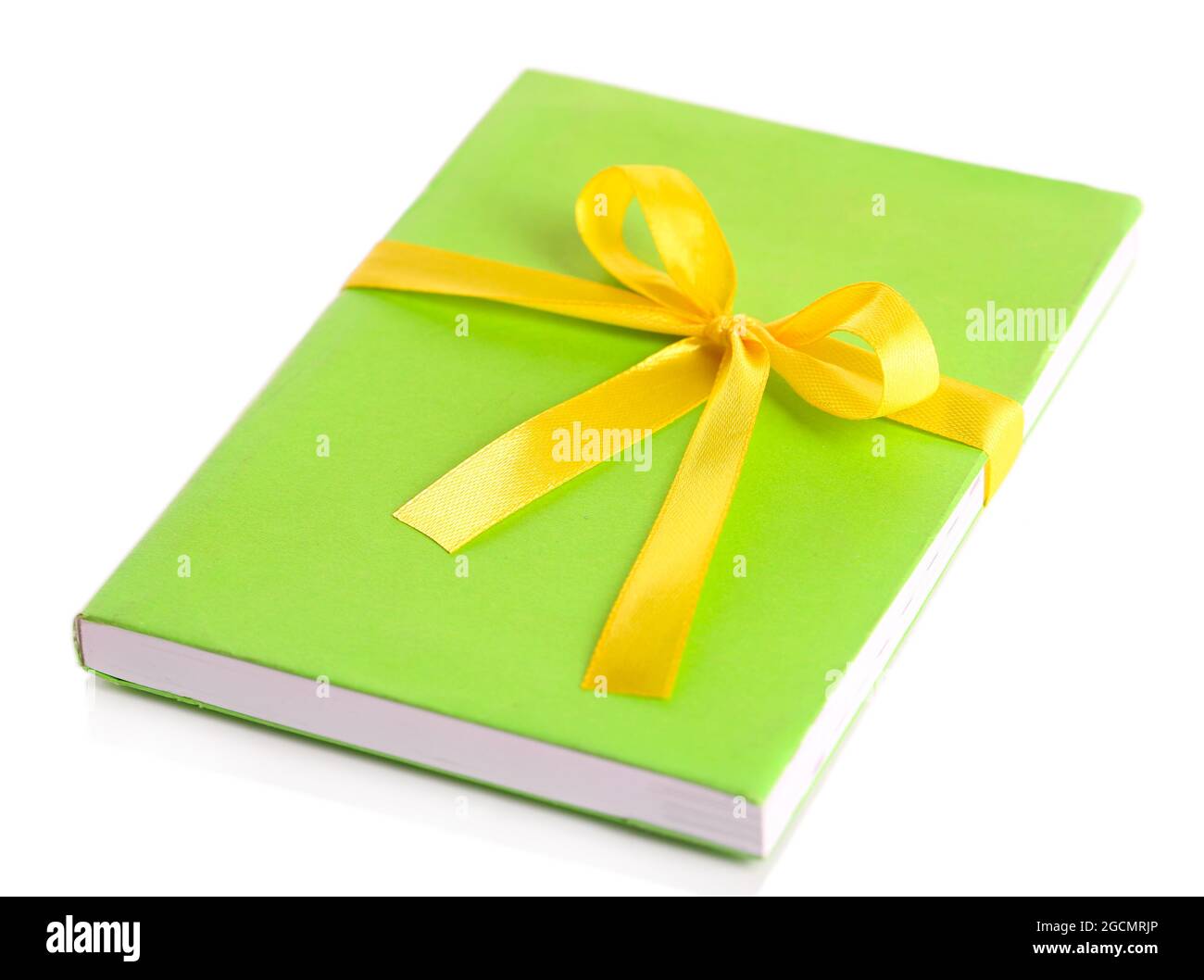 Book wrapped with color ribbon, isolated on white Stock Photo - Alamy