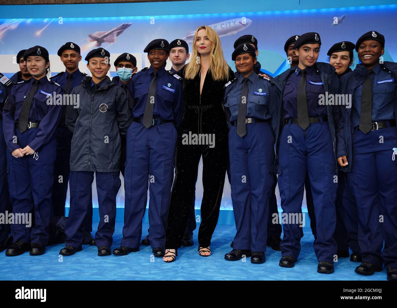 https://c8.alamy.com/comp/2GCMXJJ/jodie-comer-alongside-police-cadets-at-cineworld-leicester-square-central-london-for-the-premiere-of-free-guy-picture-date-monday-august-9-2021-2GCMXJJ.jpg