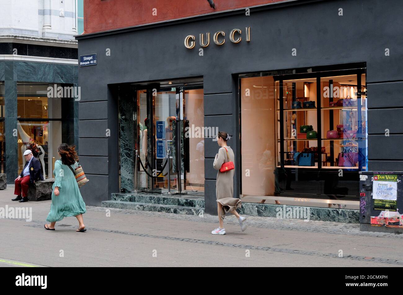 Copenhagen, Denmark.,09 August 2021,/Tourists and shopper pass by Gucci store on Stroeget financial in capital. Jose Stock Photo Alamy