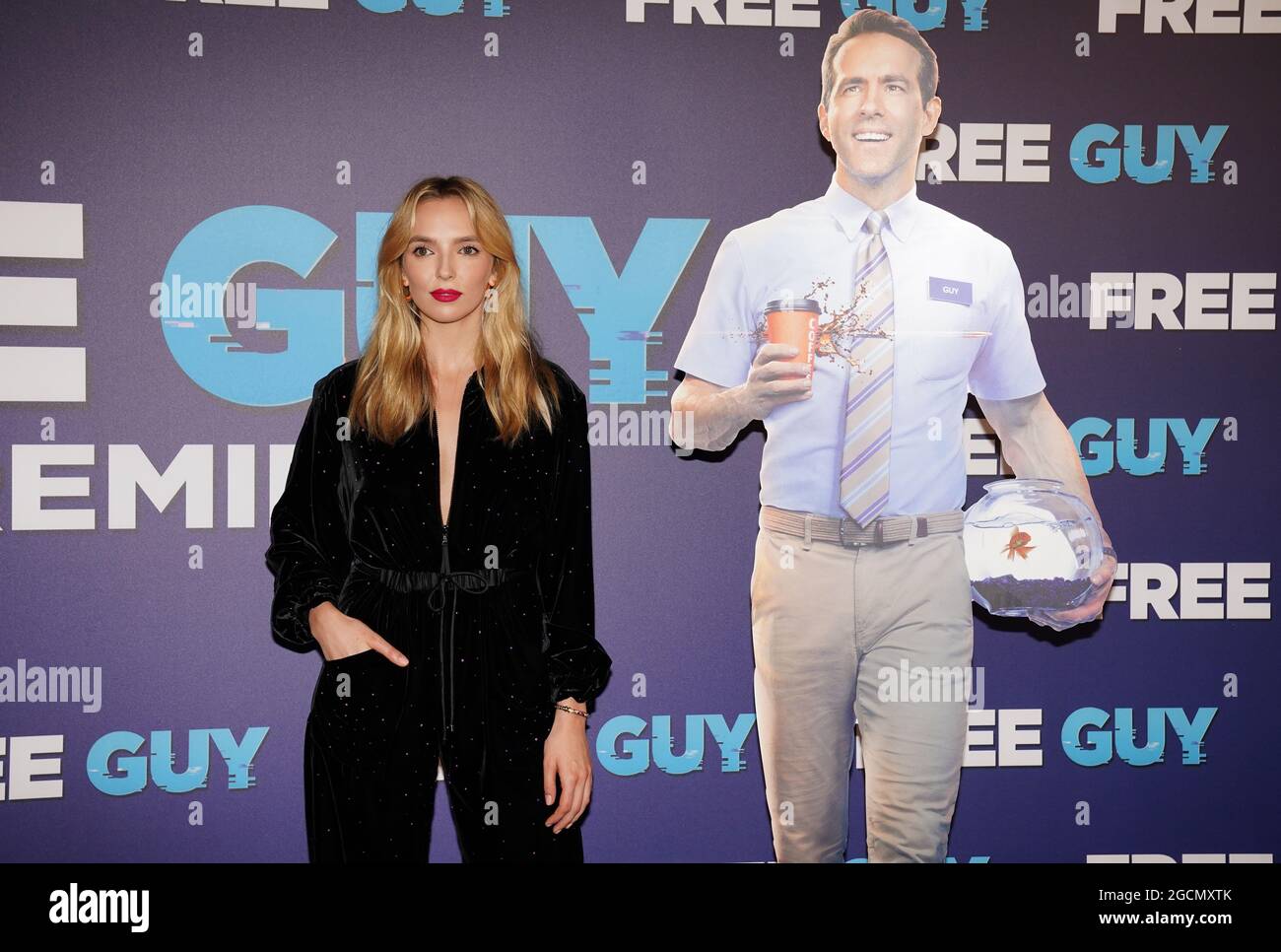 https://c8.alamy.com/comp/2GCMXTK/jodie-comer-alongside-a-cardboard-cutout-of-ryan-reynolds-at-cineworld-leicester-square-central-london-for-the-premiere-of-free-guy-picture-date-monday-august-9-2021-2GCMXTK.jpg