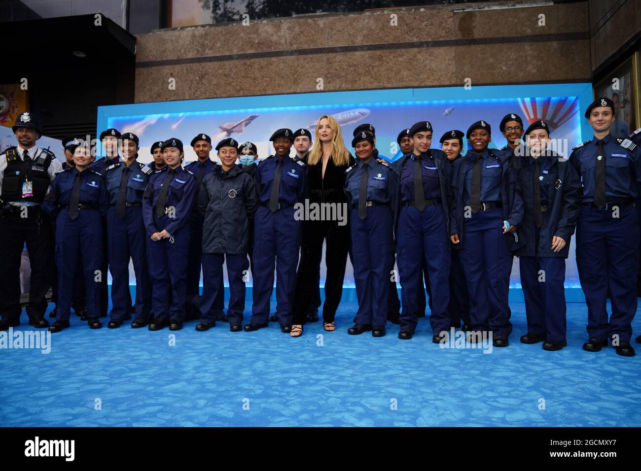 https://c8.alamy.com/comp/2GCMXY7/jodie-comer-alongside-police-cadets-at-cineworld-leicester-square-central-london-for-the-premiere-of-free-guy-picture-date-monday-august-9-2021-2GCMXY7.jpg