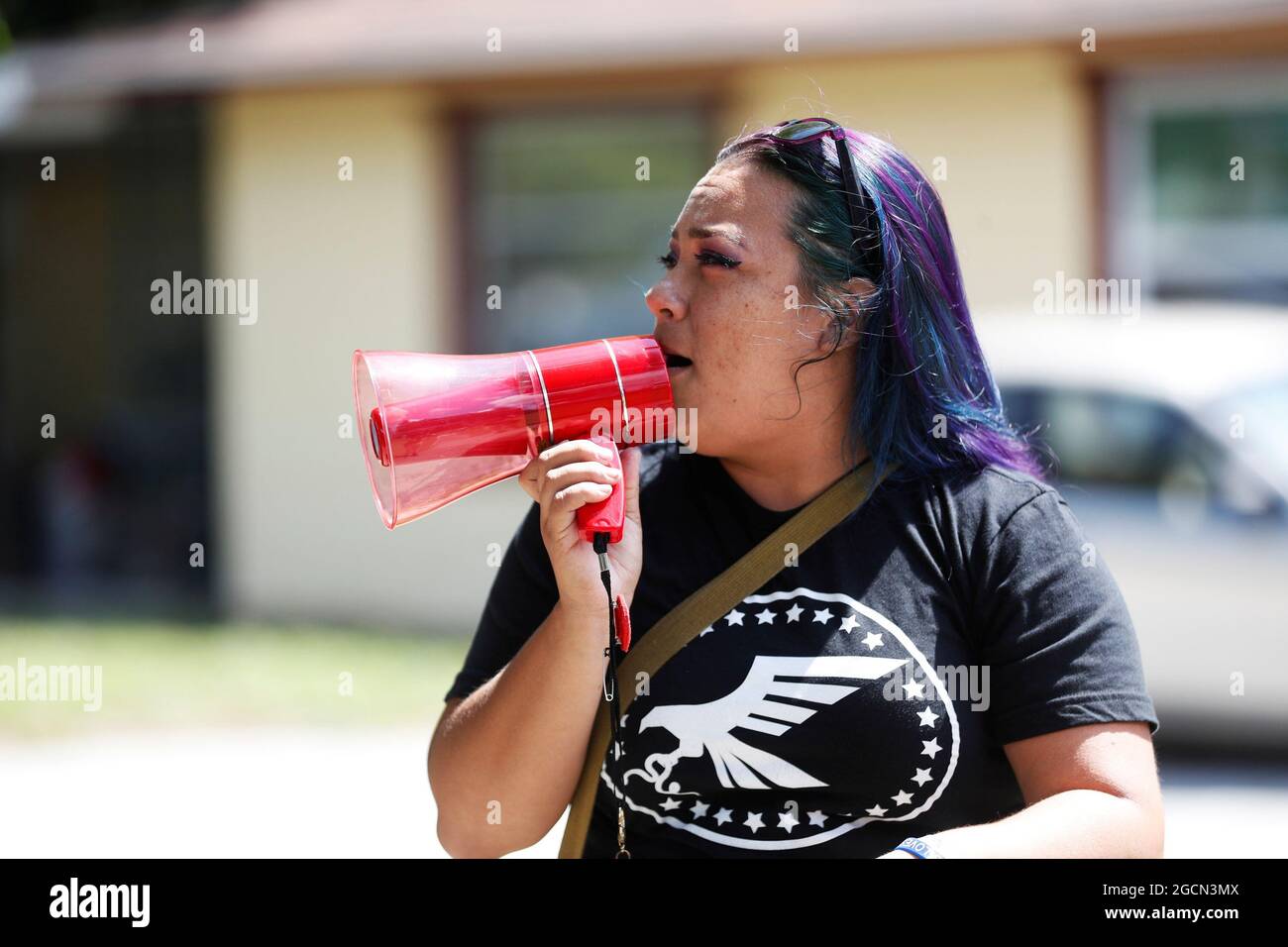 Sweet Gonzelaz, a member of the 'Community Patriots'  protests against wearing masks in schools before the special called school board workshop at the Pinellas County Schools Administration Building in Largo, Florida, U.S., August 9, 2021. REUTERS/Octavio Jones Stock Photo