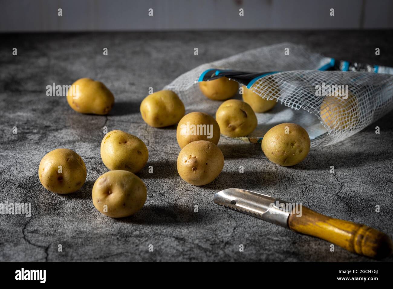 Raw baby yellow potatoes. Stock Photo