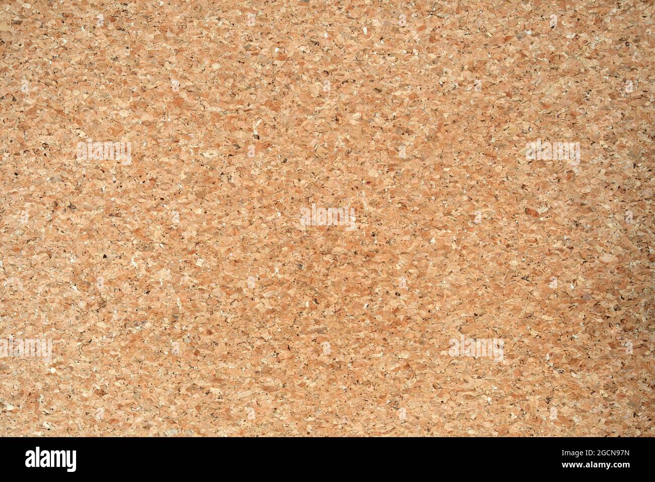 blank natural colored corkboard abstract background texture, simple beige Stock Photo