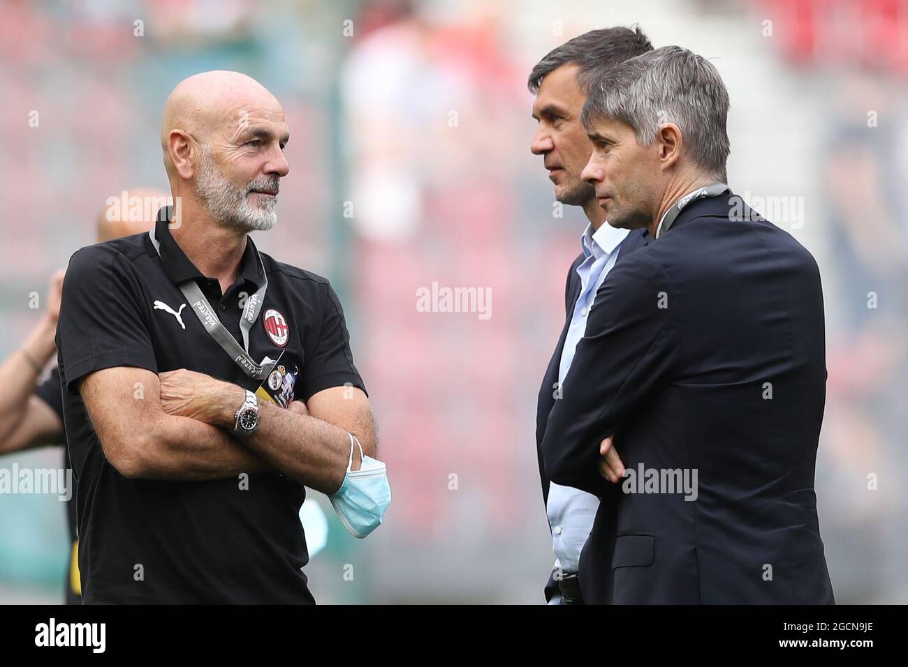 Klagenfurt, Austria, 8th August 2021. Stefano Pioli Head coach of AC Milan  discusses with AC Milan Director of Sport Federico Massara as Paolo Maldini AC  Milan First Team Technical Director as the