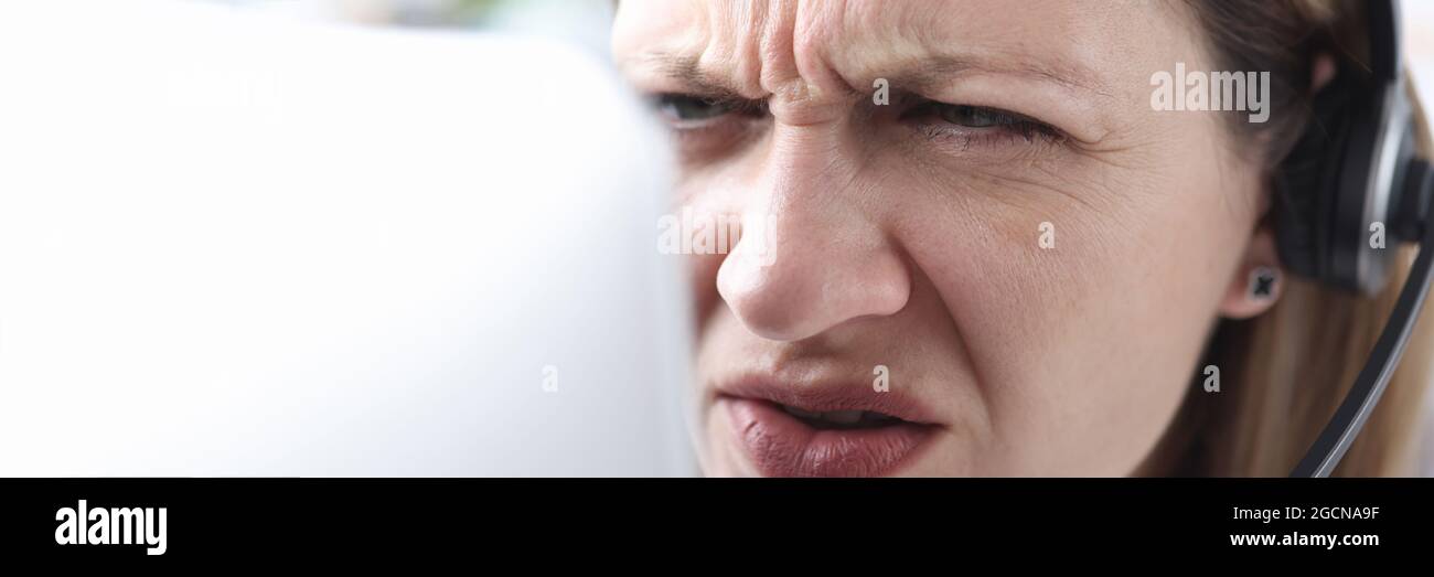 Portrait of woman with poor eyesight who looks into monitor Stock Photo Alamy