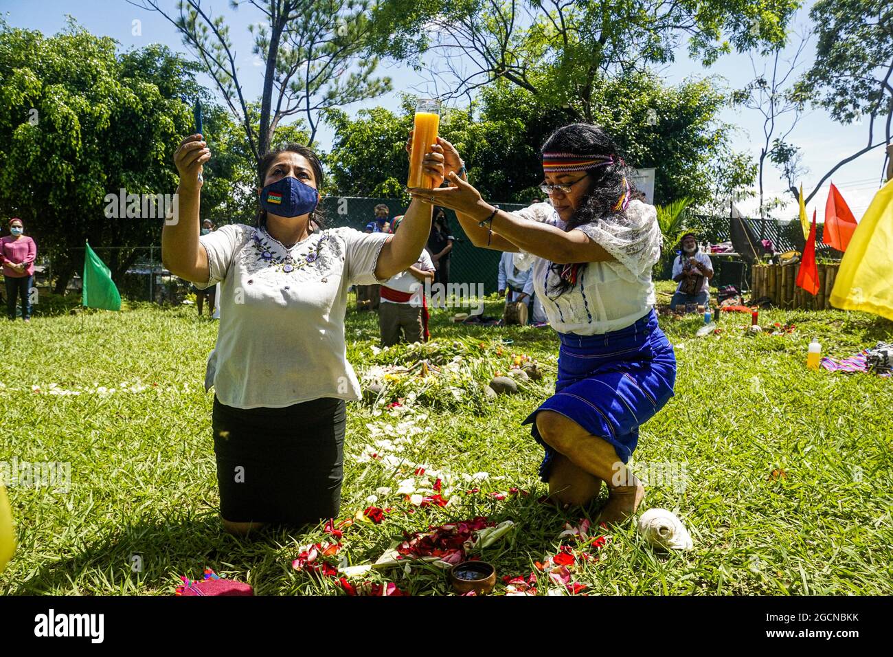 Izalco, El Salvador. 9th Aug, 2021. Organized Indigenous Community members from the Izalco Nahua region perform a ceremony in honor of nature as part of a commemoration on International Indigenous Peoples Day (Credit Image: © Camilo Freedman/ZUMA Press Wire) Stock Photo