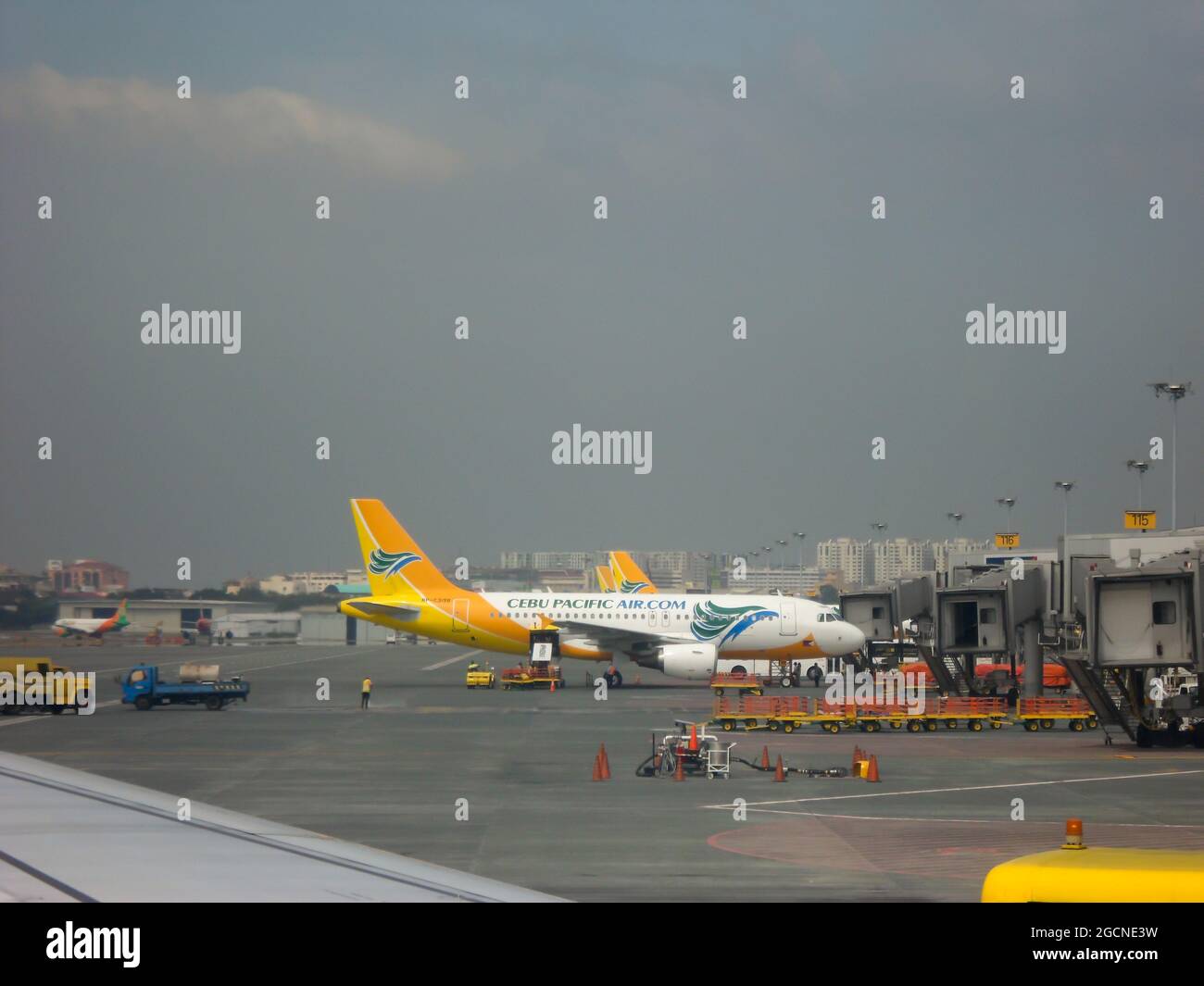 Airbus A319 is parking a the apron at the international airport in Manila on the Philippines 14.12.2012 Stock Photo