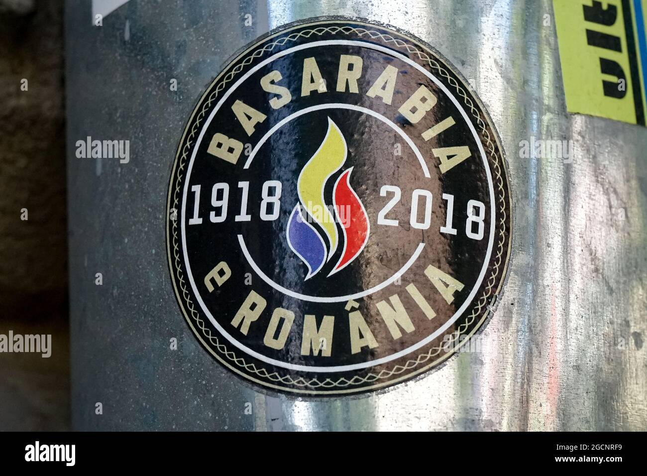 Bucharest, Romania - July 08, 2021: A sticker with the message 'Basarabia e Romania' (Basarabia is Romania), is pasted on the rainwater drain pipe of Stock Photo