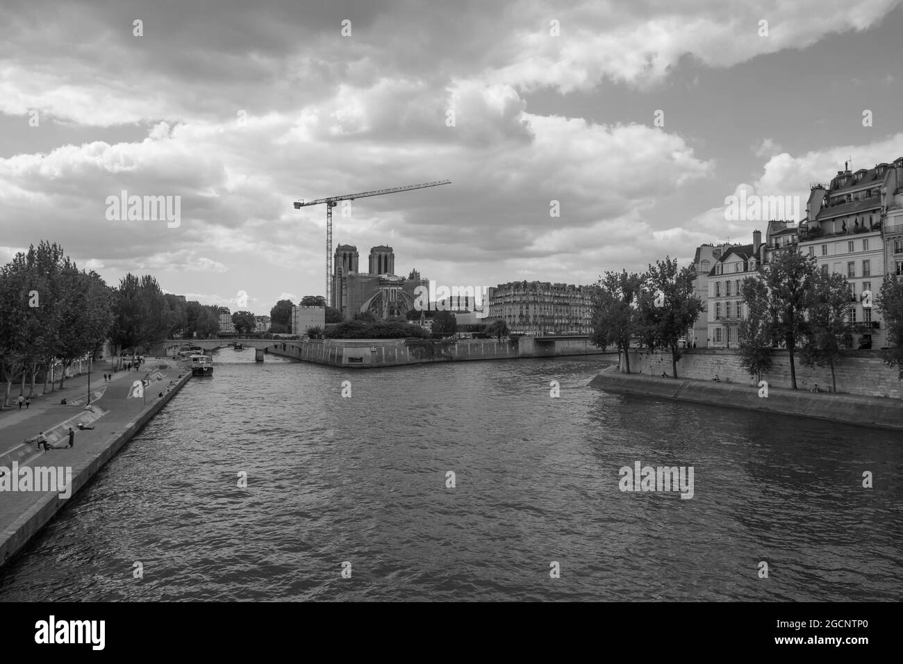 View From Seine River Of Restoration Of Notre-Dame de Paris Cathedral Stock Photo
