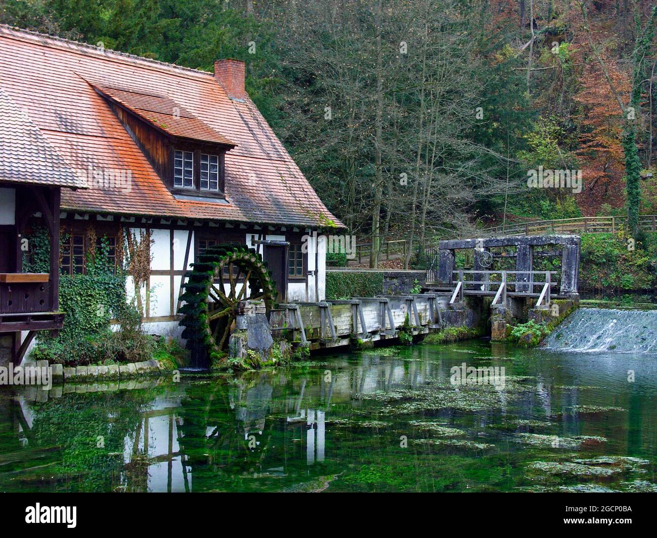 Blaubeuren: historic hammer mill at the Blautopf, Alb-Donau District, Baden-Wuerttemberg, Germany Stock Photo