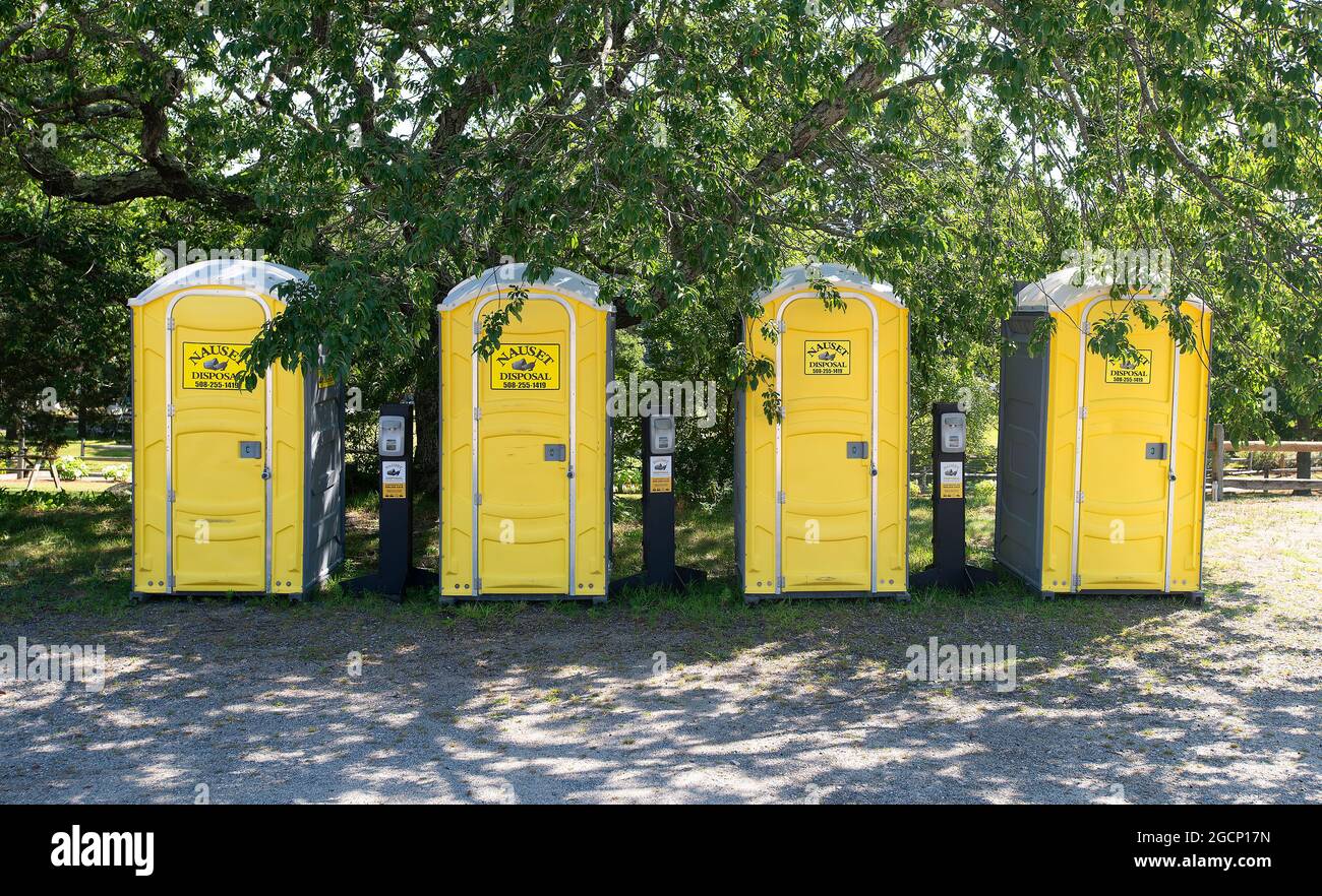Porta Johns lined up in a playhouse parking lot on Cape Cod, USA Stock