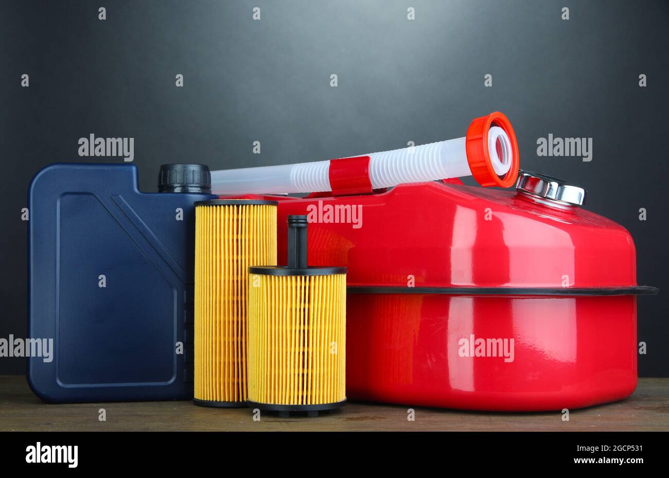 Diesel and oil canisters on grey background Stock Photo Alamy
