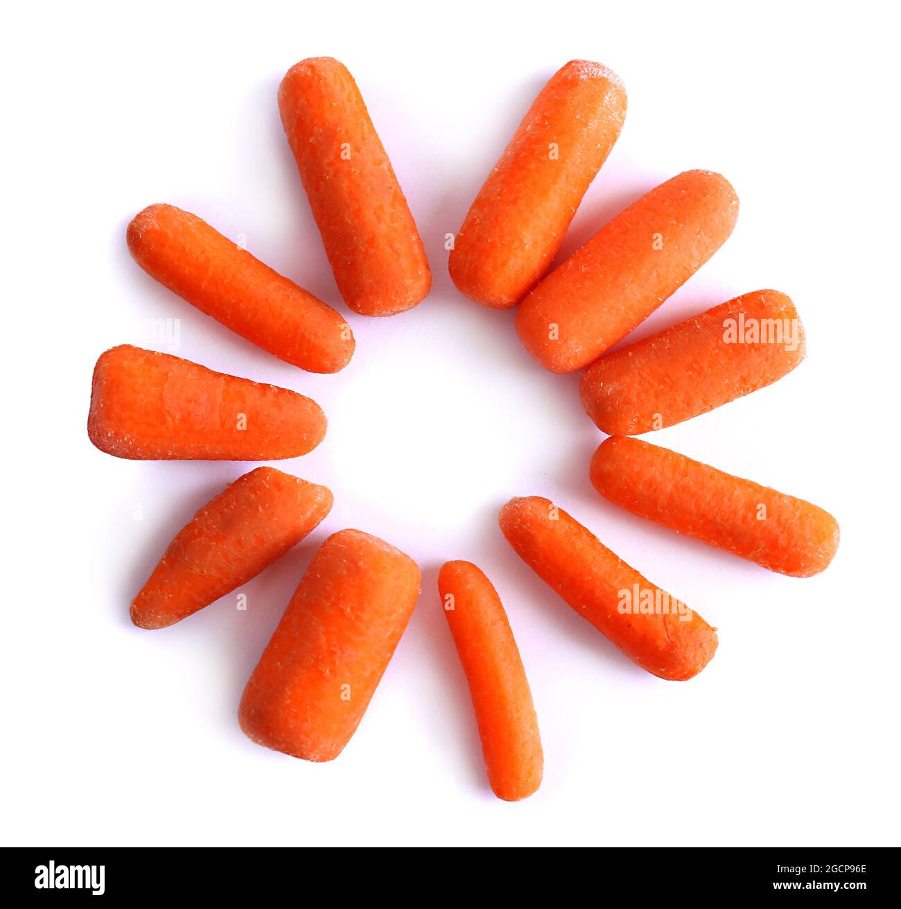 Baby carrot sticks isolated on white Stock Photo Alamy
