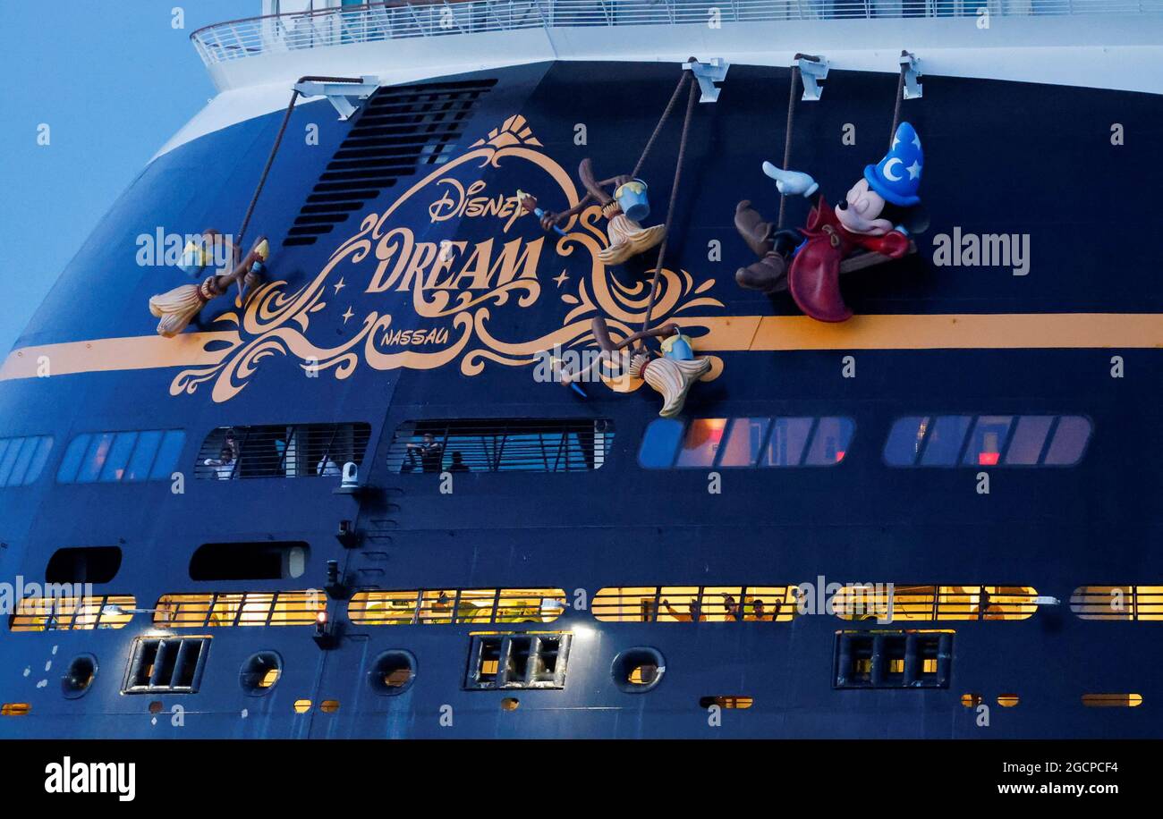 The stern of the Disney Dream, a Disney Cruise Lines' ship, is seen as it sails to the Bahamas on the first Disney cruise for paying customers since they were stopped during the coronavirus disease (COVID-19) pandemic, from Port Canaveral in Florida, U.S., August 9, 2021. REUTERS/Joe Skipper Stock Photo