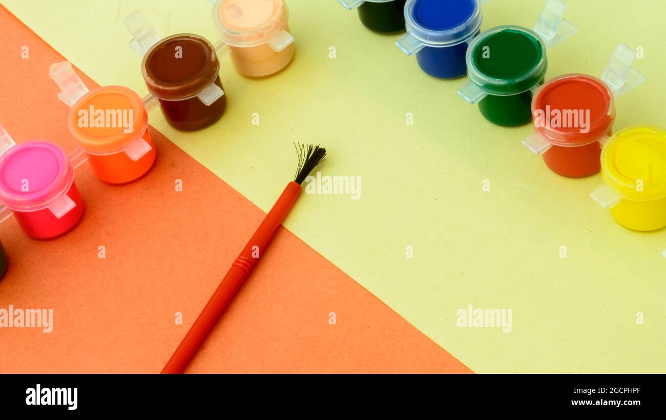 Colors art background. Watercolor paints and paintbrush. knolling concept. Stock Photo
