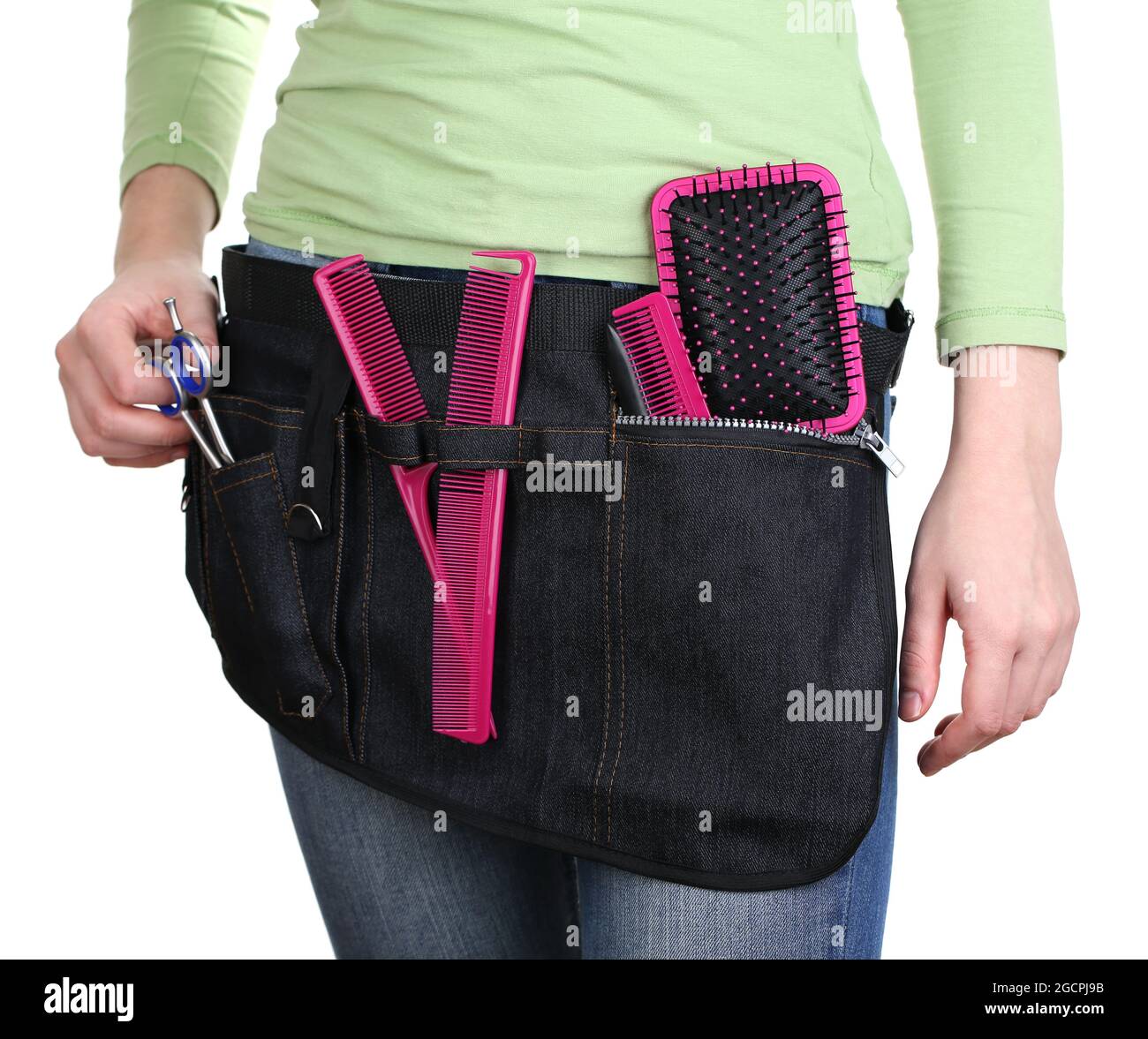 Woman hairdresser with tool belt isolated on white Stock Photo Alamy