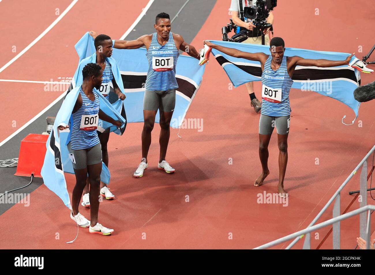 Team Botswana (BOT) celebrate third place and the bronze medal after the Athletics Men's 4 x