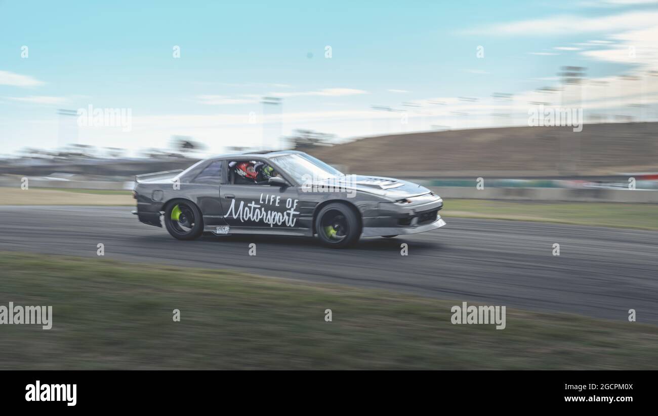VicDrift Practice Day 2: Grey Nissan 180SX drifts down the hill at Calder Park Raceway Reverse Over The Hill layout. Driven Life of Motorsport team. Stock Photo
