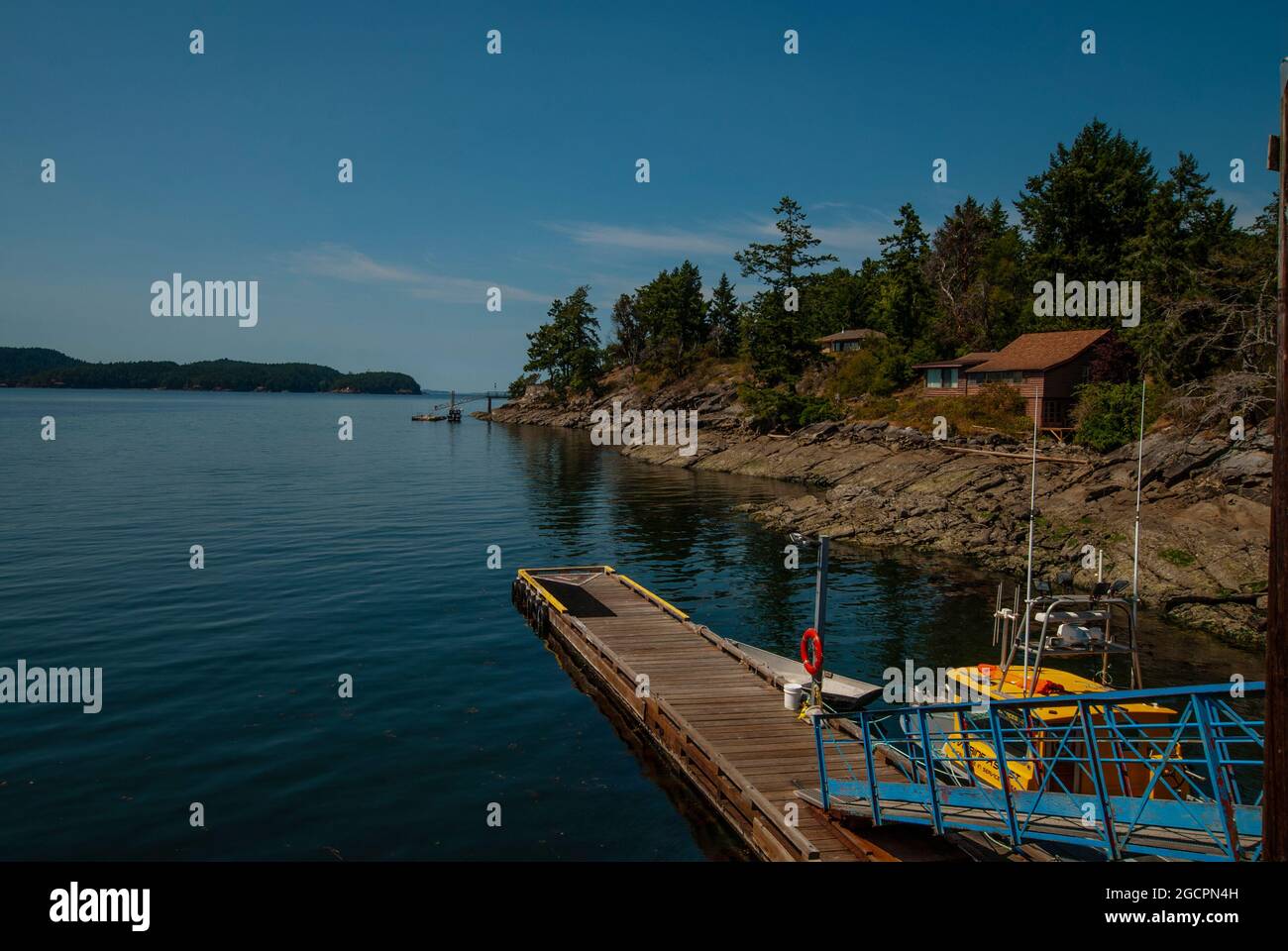 Wooden float at Hope Bay, North Pender Island, British Columbia, Canada Stock Photo