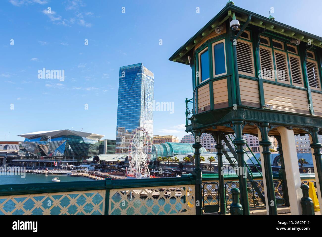 Sydney, Australia - October 14, 2020: Observation tower at Darling Harbour, Sydney. The pier opposite of Cockle Bay Wharf. A Ferris wheel in the backg Stock Photo