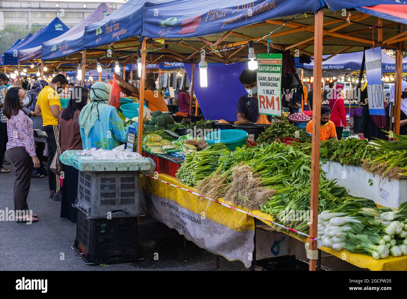 Vegetable traders at a fresh market in Putrajaya, near the capital