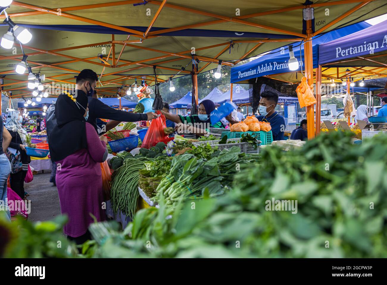 Vegetable traders at a fresh market in Putrajaya, near the capital